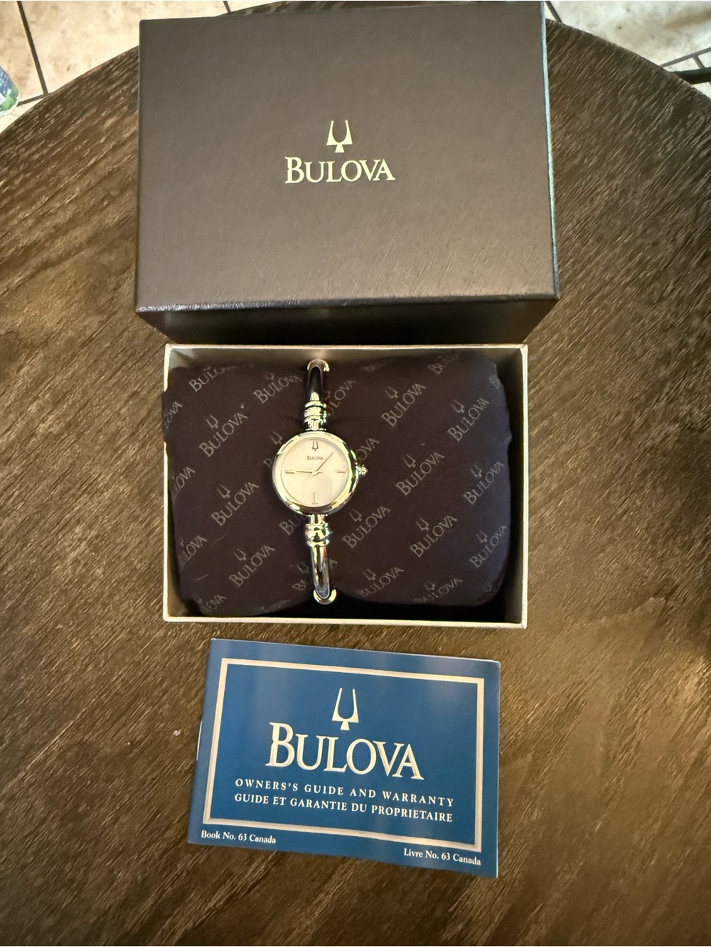 Bulova Women's Silver Bangle Watch with White Dial